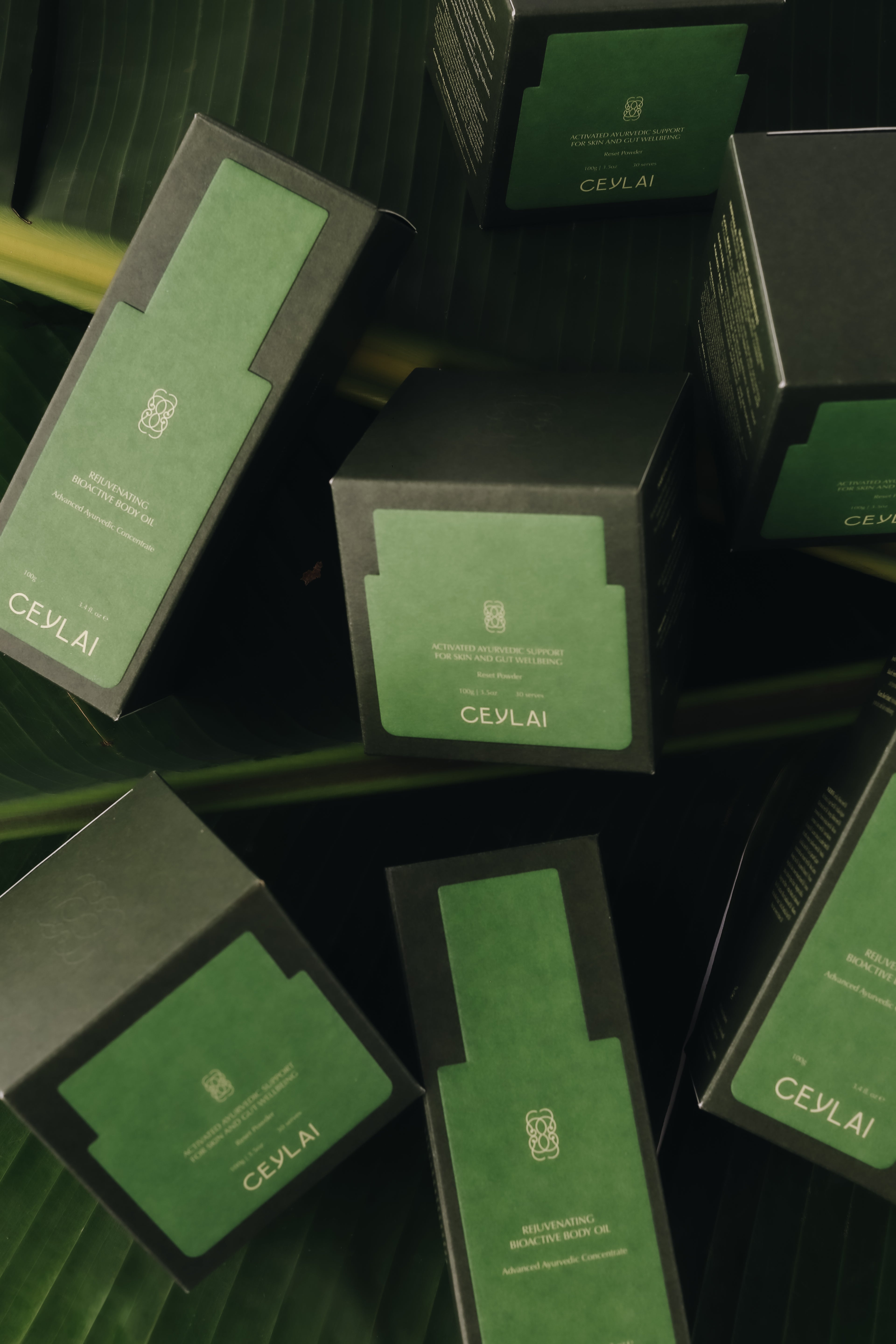 Stack of Ceylai skincare product boxes on a banana 
