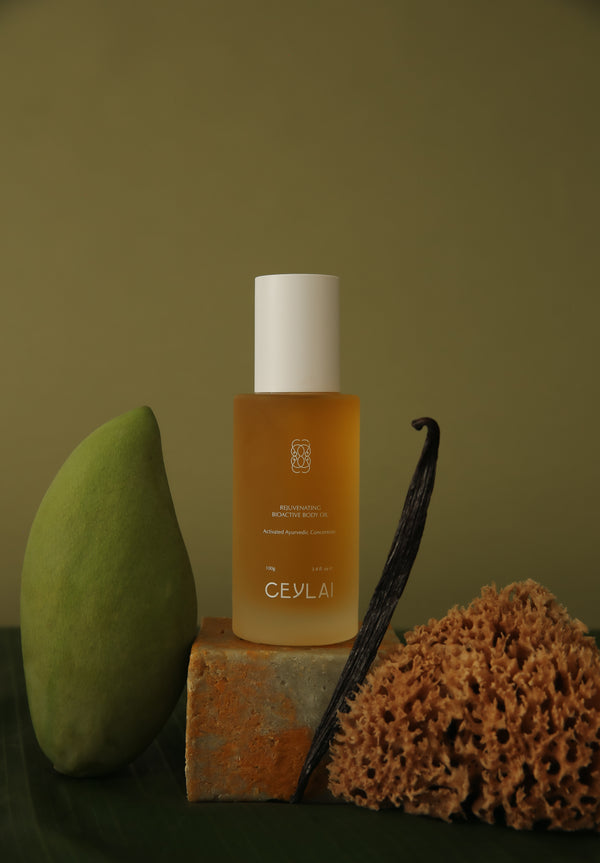 Ceylai Rejuvenating Body Oil - Activated Ayurvedic Concentrate 100g

Ceylai body oil bottle with a green mango, vanilla bean, and coral.

Formulated with a considered selection of Ayurvedic plant oils and bioactive extracts, CEYLAI Body Oil supports the skin barrier and long-term skin health through nourishment rather than stimulation. Each oil is chosen for its ability to calm inflammatory stress, replenish essential lipids, and work in harmony with the skin’s natural ecosystem.
