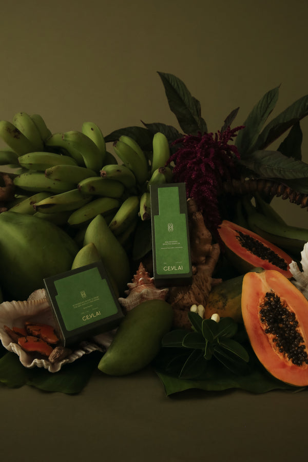 Ceylai Reset Powder and Body Oil on lush tropical background